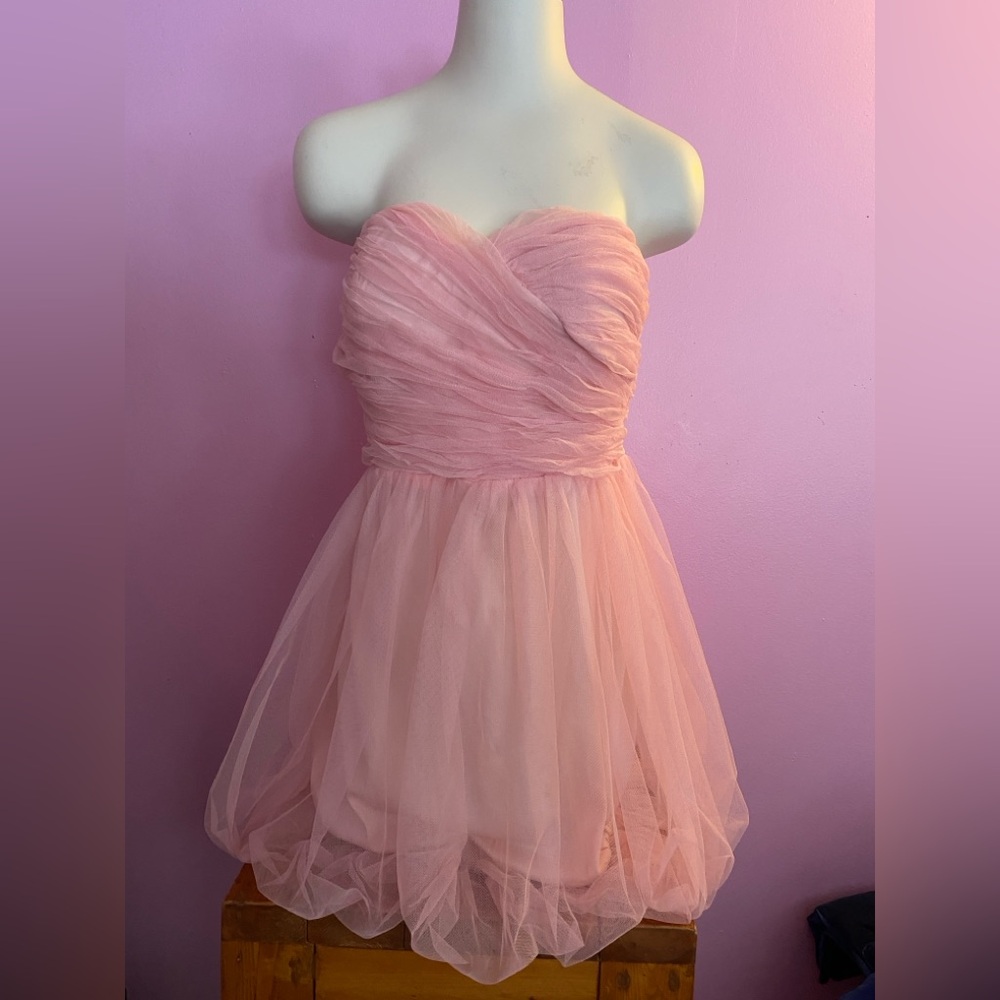 Blush Colored Strapless Mini Prom Dress.